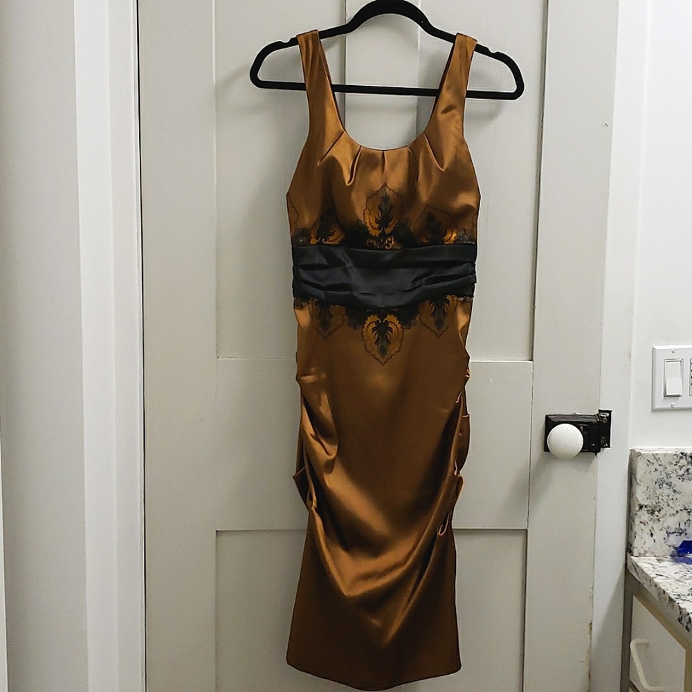 Le Chateau Women's SM cocktail dress brown with gold and black accents.
